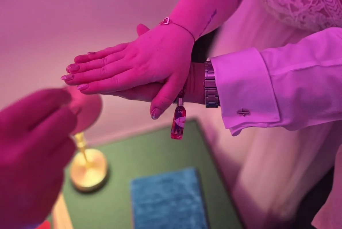 Close-up magician entertaining wedding guests in North Wales